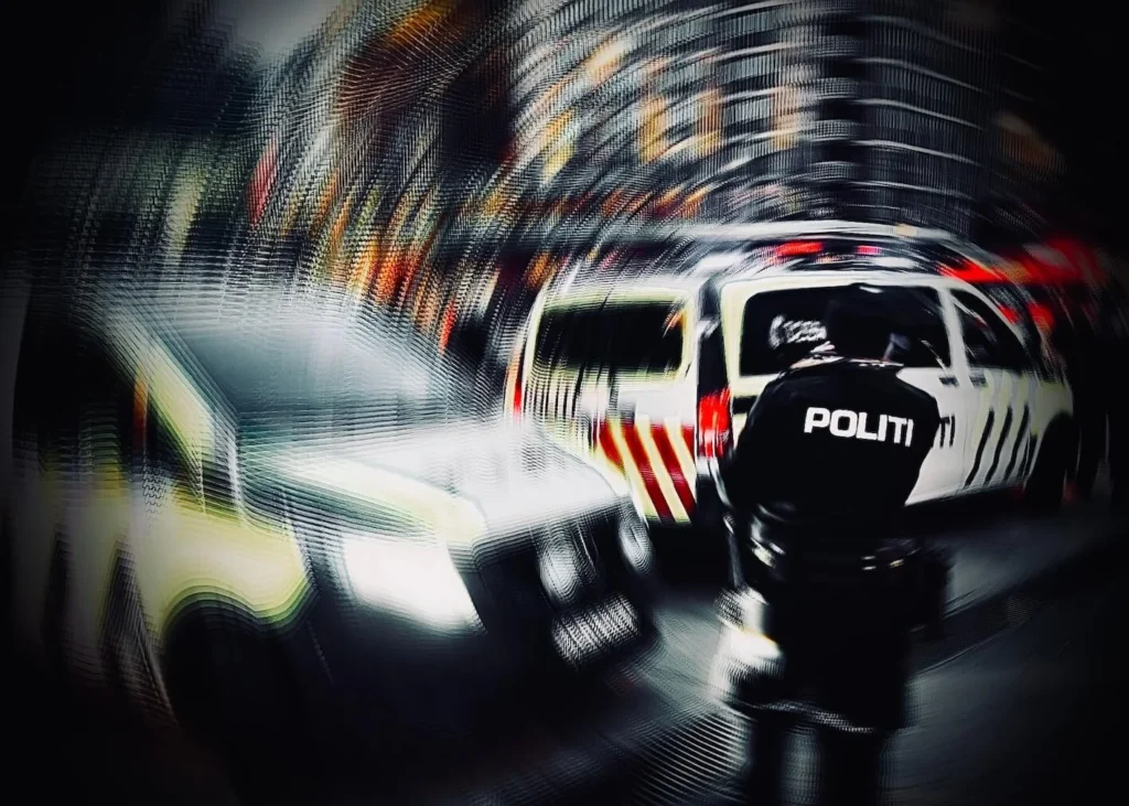 Oslo police, Oslo Police vehicles and an officer, representing weakened law enforcement and systemic failures in anti-trafficking operations. Oslo Police Corruption, Police Misconduct Norway, Oslo Police District Accountability, Norwegian Police Corruption Scandal, Law Enforcement Abuse Oslo, Police Cover‑up Oslo, Whistleblower Retaliation Norway, Human Trafficking Case Mismanagement, Systemic Police Failure Oslo, Ministry of Justice and Public Security, Oslo Police District, Public Prosecution Service of Norway, Norwegian Courts, The Norwegian Bureau for the Investigation of Police Affairs, Kripos (National Criminal Investigation Service), Vest politidistrikt (Western Police District), Bergen politidistrikt, National Police Directorate Norway, Australian Department of Home Affairs, U.S. Department of State, Interpol Human Trafficking, Italian Ministry of Foreign Affairs, Human Rights Committee, ECHR (European Court of Human Rights), Council of Europe, Human Rights Mechanisms, UN Convention against Corruption, UN Special Rapporteur on Torture